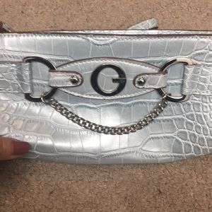 Guess metallic clutch
